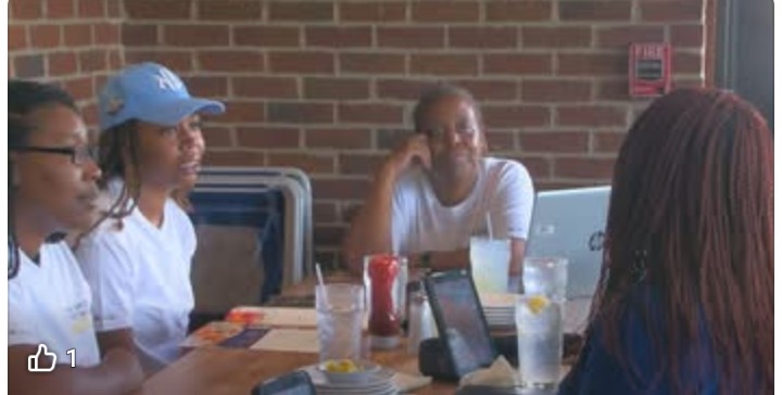 Bridge Network members meeting together around a table
